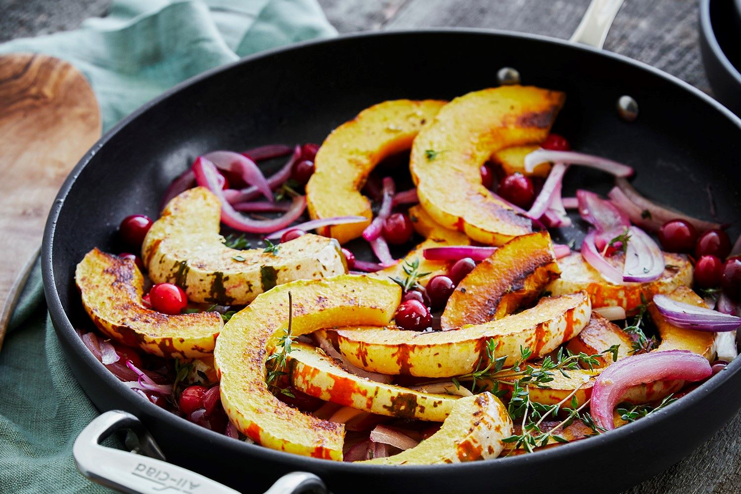 Get the Roasted Winter Squash with Red Onions and Cranberries recipe!